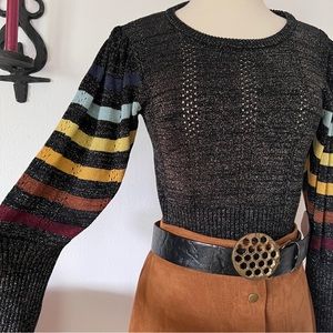 Jen's Pirate Booty Black Metallic Sweater with balloon sleeves. 
XS/S Rayon